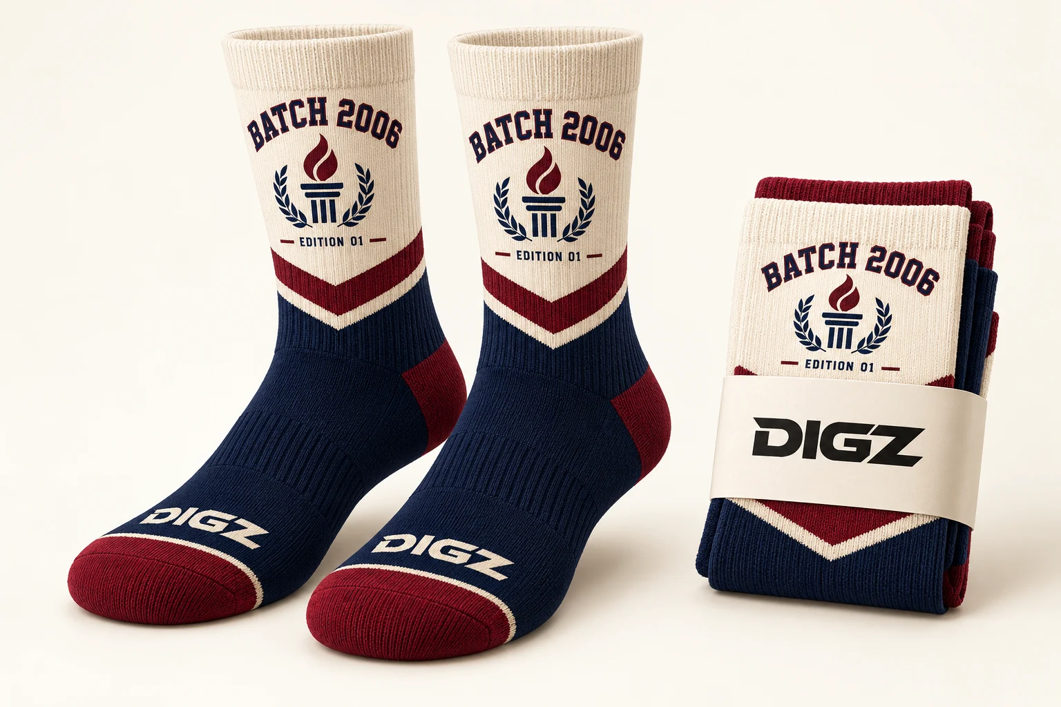 Burgundy, navy, and cream fictional Batch 2006 commemorative socks with matching packaging